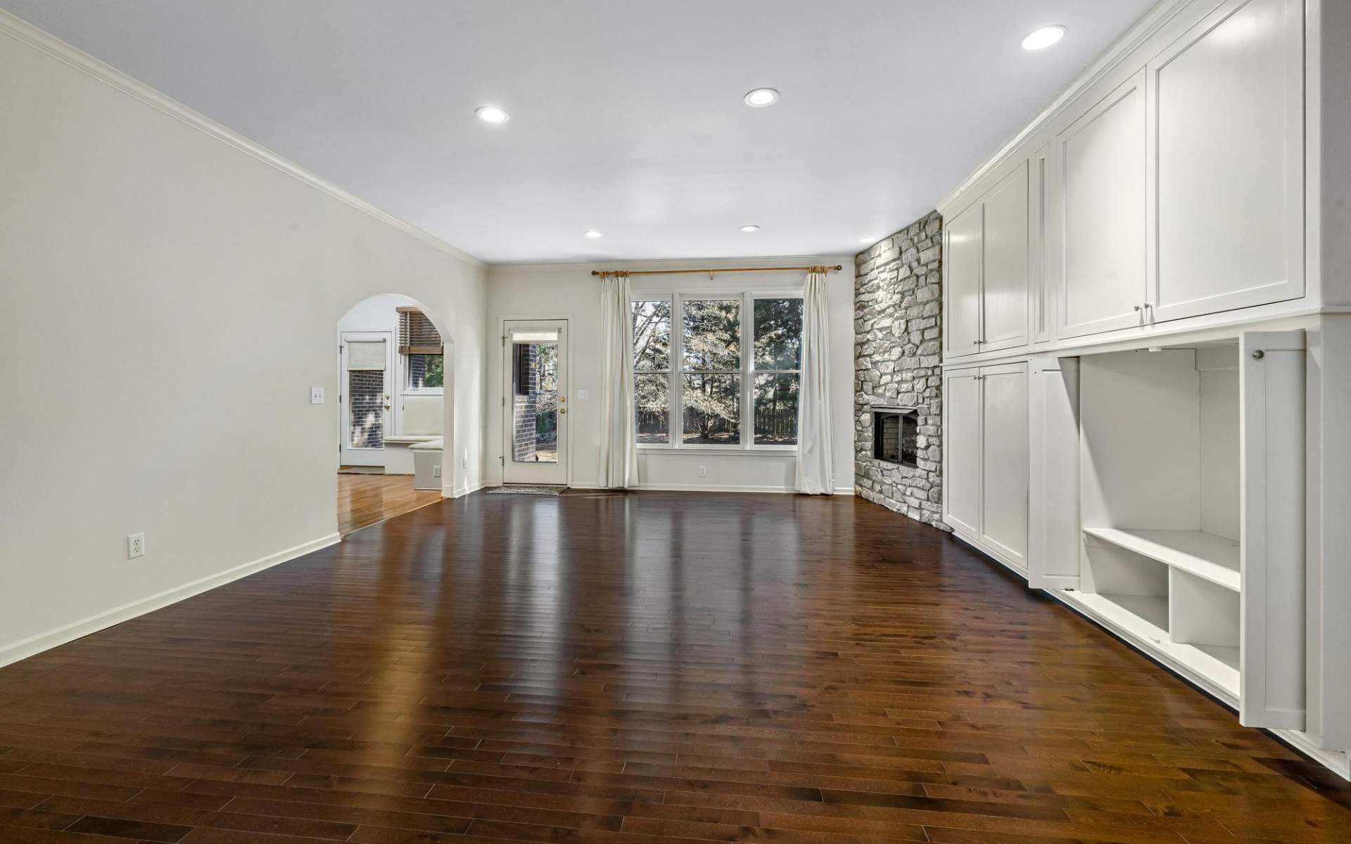 Newly installed hardwood flooring in an open concept living room