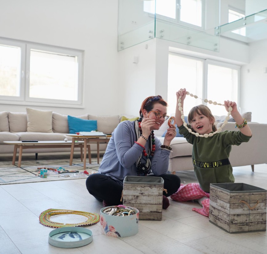 family playing on hardwood flooring